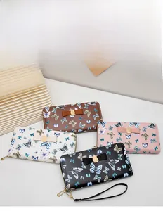 Détail de portefeuilles à imprimé papillon floral avec nœud et boucle en métal doré