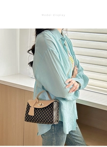Detailed view of women's vintage square crossbody bag with chain strap and printed pattern