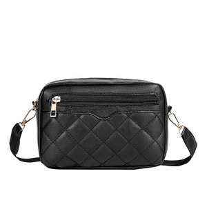 Quilted black PU leather crossbody bag with gold zipper and detachable canvas strap