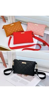 Close-up of quilted crossbody bag textures with metal accents and adjustable straps