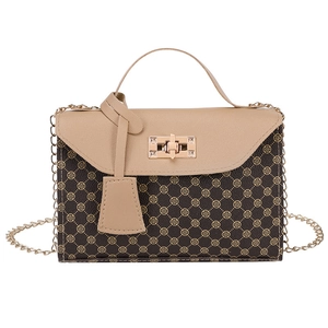 Chic two-tone handbag with clover print, leather flap, and gold chain strap