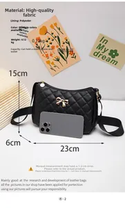 Close-up of black quilted bag showing 23x15x6cm size and golden bow detail