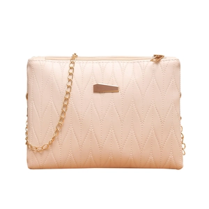 Pink quilted shoulder bag with gold chain strap and elegant V-shaped texture