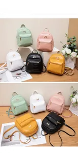 Mini faux crocodile leather backpacks in five vibrant colors with metal bow detail