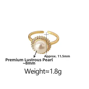 Detailed view of 8mm pearl ring with zirconia halo on gold adjustable band