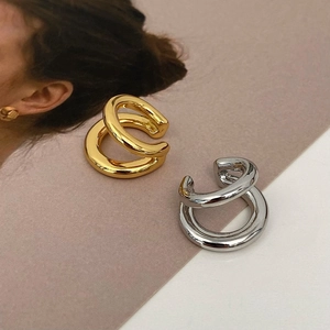 Minimalist double layer ear cuff in gold and silver finish for non-pierced ears