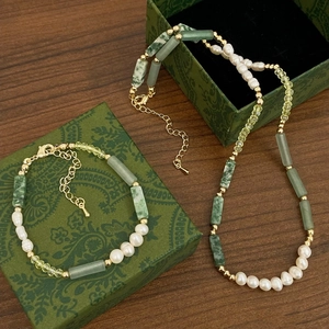 Bamboo style green jade and pearl necklace jewelry set on vintage display boxes