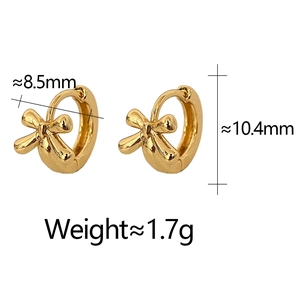 Detailed view of gold bow hoop earrings with dimensions 8.5mm width and 1.7g weight