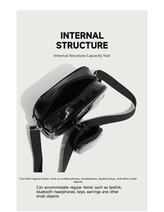 Internal view of glossy black PU leather crossbody bag showing spacious main compartment