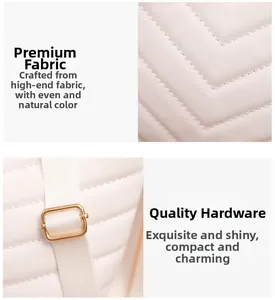 Detail of white PU leather bag featuring V-shaped quilting and golden metal hardware