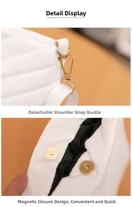 Detail of white PU bucket bag featuring gold hardware and magnetic snap closure