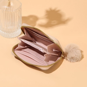 Elegante mini portafoglio a fisarmonica da donna con pompon rosa e cerniera dorata