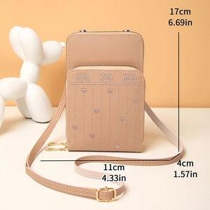 Détails d'un petit sac bandoulière rose avec broderie papillon et dimensions précises