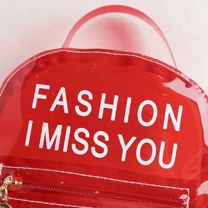 Sac à dos transparent en PVC rouge pour femmes avec fermeture éclair en métal