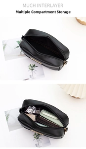 Internal view of black PU leather shoulder bag with multiple storage compartments