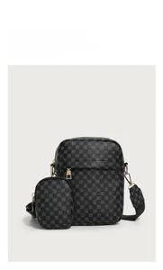 Detail of grey vintage shoulder bag with geometric patterns and round coin purse
