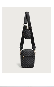 Detail of grey printed shoulder bag with small round coin purse and gold hardware