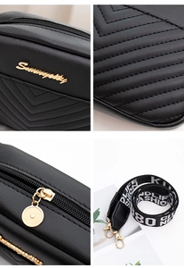 Detail of V-quilted black leather bag with gold logo and Life Fashion wide nylon strap