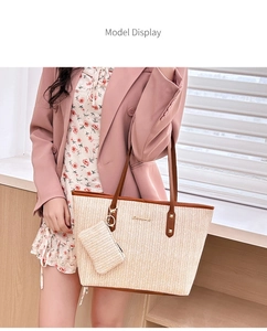 Straw woven tote bag set featuring brown leather handles shown with a fashion model display