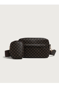 Détail d'un sac bandoulière vintage fleuri avec une petite pochette ronde amovible