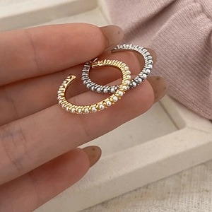 Retro twisted metal hoop earrings with pearls in gold and silver finish for women