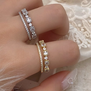 Elegant gold and silver double-layer zircon rings set with geometric crystal accents