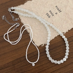 Collier double rang en pierres naturelles avec pendentif en cristal transparent