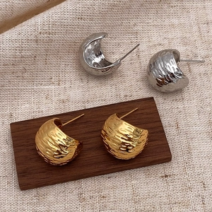 French style C-shaped metal stud earrings with textured hammered finish in gold and silver