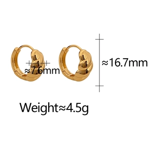 Detail view of twisted gold hoop earrings showing 16.7mm height and 7.6mm width dimensions