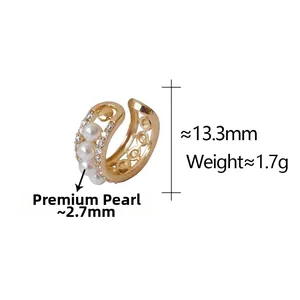 Detail view of a 13.3mm gold ear cuff featuring 2.7mm pearls and zircon accents