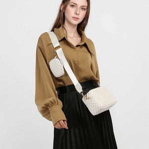 Fashionable crossbody bag with geometric pattern, wide strap and small round coin purse