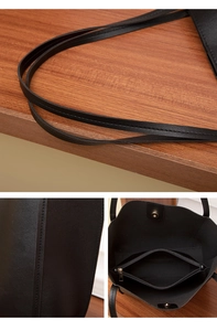 Détails des coutures du sac cabas noir et vue du compartiment intérieur zippé pratique