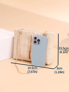 Detailed size dimensions of woven straw crossbody bag with golden chain and tassel
