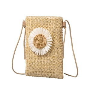 Summer woven straw crossbody phone bag featuring a large white daisy flower ornament