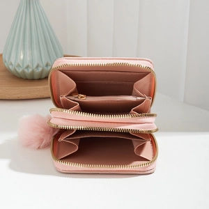 Quilted pink double-layer leather wallet with rhombus pattern and fuzzy ball pendant