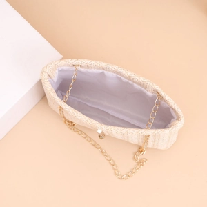 Straw weave chain crossbody bag in beige with gold shoulder strap and fabric lining