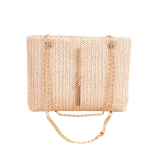 Minimalist beige woven straw chain bag with gold tassel pendant and metal straps