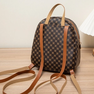 Brown monogram backpack for women with polka dot print and stylish leather straps