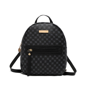 Fashionable black women's mini backpack with clover print and gold hardware on white background