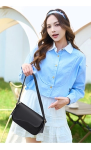 Chic black sequin shoulder bag shown in an outdoor camping lifestyle setting