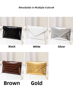 Detail of five glossy crocodile pattern envelope bags with elegant gold chain straps