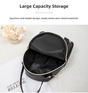 Detail view showing large capacity black pebble leather mini backpack interior and golden zipper