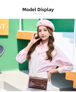 Model wearing a pink beret with sequin star accents and a striped fashion shirt