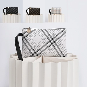 Minimalist patterned women's clutch bags with wristlets and secure zipper closure