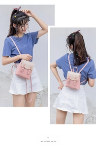 Mini pink and off-white dual-strap women's backpack showing side and back view