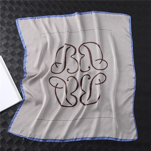 Elegant houndstooth silk square scarf with blue borders and brown floral pattern