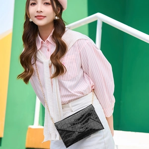 Chic black crocodile pattern patent leather envelope crossbody bag with gold chain