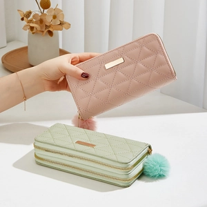 Quilted long wallets in pink and mint green with chic faux fur pom pom bag charms