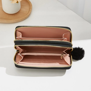 Elegant black long wallet with triangle quilt pattern and pink interior compartments