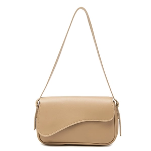 Fashionable khaki faux leather shoulder bag with asymmetrical flap and sleek strap